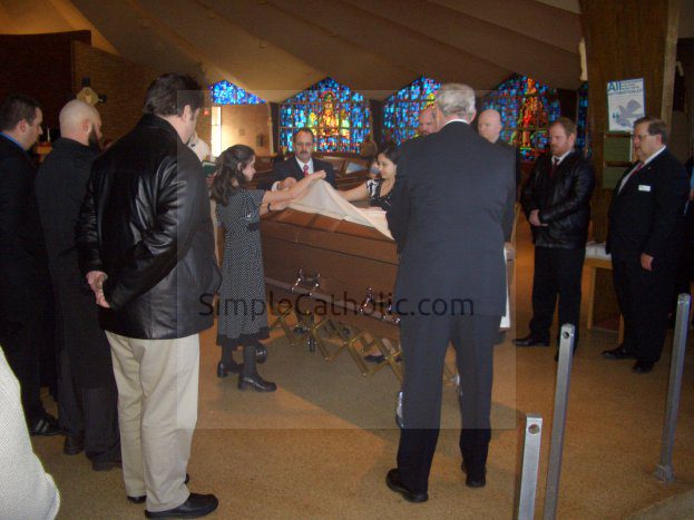 Funeral Service – Pall Bearers with Casket - Simple Catholic