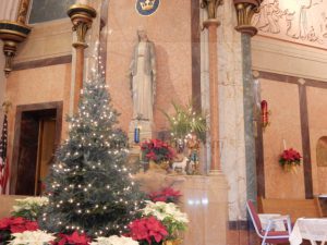 Blessed Virgin Mary Statuary Surrounded by Christmas Decor - Simple Catholic